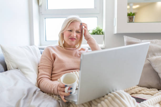 istock Upset young woman using online banking service, problem with blocked credit card, using laptop, irritated girl checking balance, internet fraud concept, bankruptcy or debt, overspend 1295021037