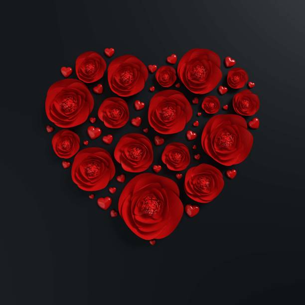 istock Red Roses are Creating Heart Shape On Black Background 1295021716