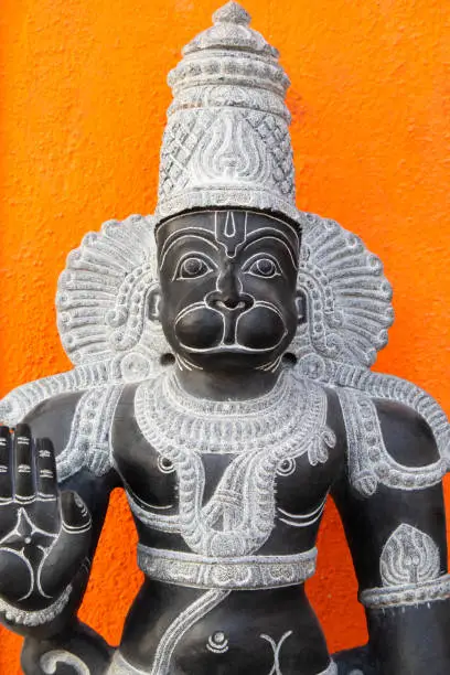 Photo of Famous Popular Handcrafted Black Stone Sculpture Statue Of Indian Hindu Lord God Idol Hanuman Bajrang Bali Made By Local Artists In Mammalapuram Tamil Nadu India