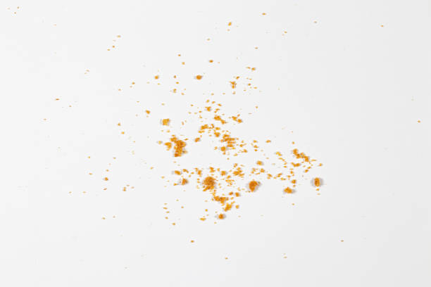 Scattered crumbs isolated on white background