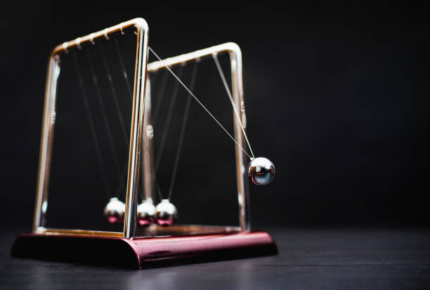 istock Newton's Cradle, Effect And Reaction Concept For Business 1295026959