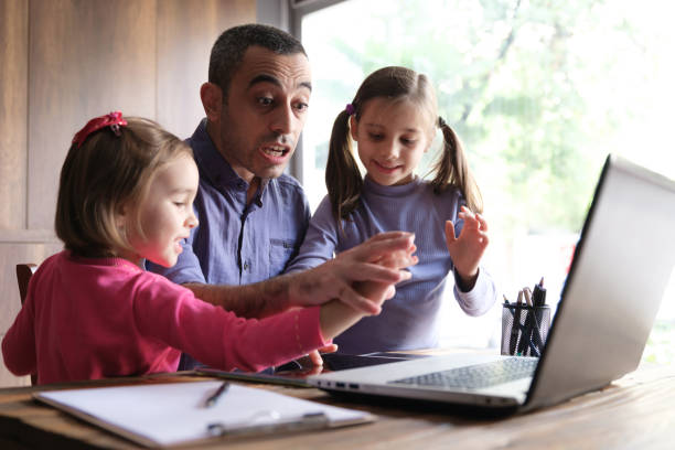 istock Father Trying To Work At Home And Children Distracting Him From Work, Concept For Difficulties Of Remoote Working In Pandemic Period 1295027358