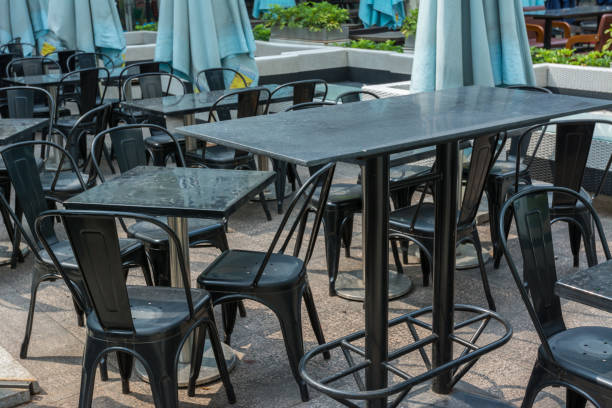 istock Lost of tables and chairs at restaurant or pub. 1295030080