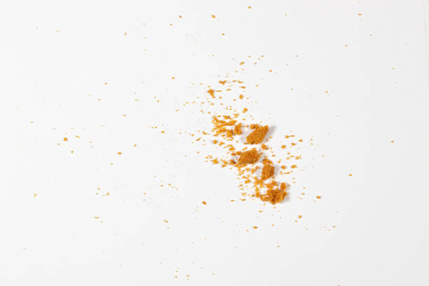istock Scattered crumbs isolated on white background 1295037119