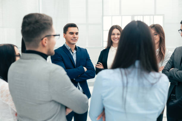 istock close up. a group of employees discussing new ideas 1295038290