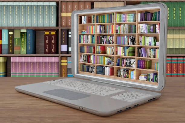 istock EBook. Download books on laptop  - 3D illustration 1295038530