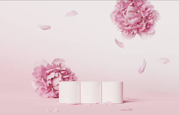 istock 3D display podium set pastel pink flower background. Falling Peony blossom. Nature minimal pedestal for beauty, cosmetic product presentation. Valentine, feminine, woman gift  copy space  3d render 1295039519