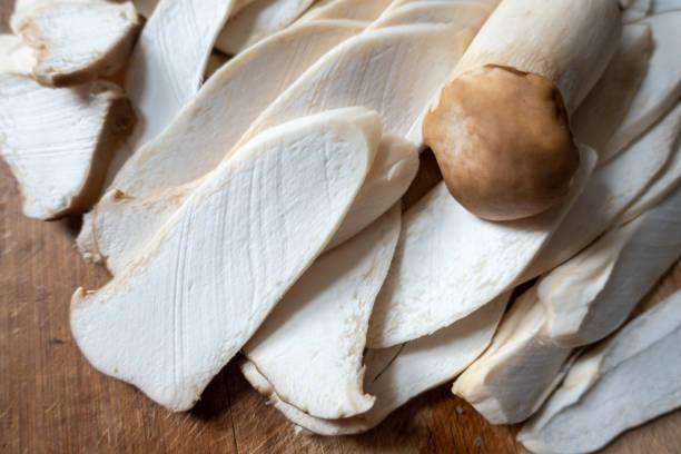 istock Cutting pleurotus eryngii 1295039880