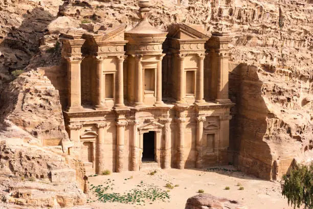 Photo of (Selective focus) Stunning view of the Ad Deir - Monastery in the ancient city of Petra. Petra is a Unesco World heritage site, historical and archaeological city in southern Jordan.