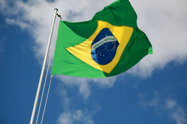 istock flag of brazil on flagpole 1295044934