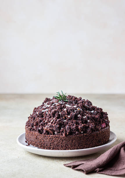 istock Homemade chocolate cake with cherry and whipped cream. Cake Mink mole or Mole hole cake. 1295048261