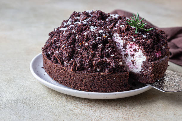 istock Homemade chocolate cake with cherry and whipped cream. Cake Mink mole or Mole hole cake. 1295048556