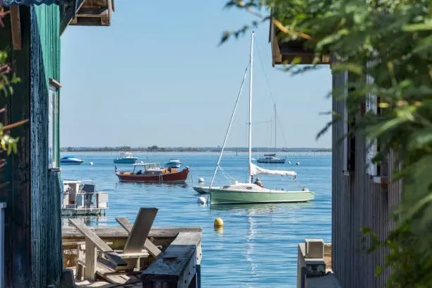 Photo of Cap Ferret (Arcachon Basin, France). Boats on the bay