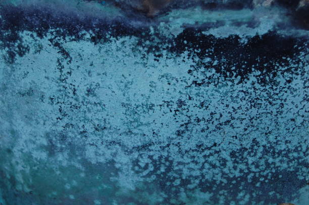 istock Extreme close up on verdigris on an old copper kettle. 1295057593