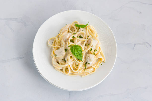 istock White Sauce Pasta with Chicken Directly Above Photo 1295062303