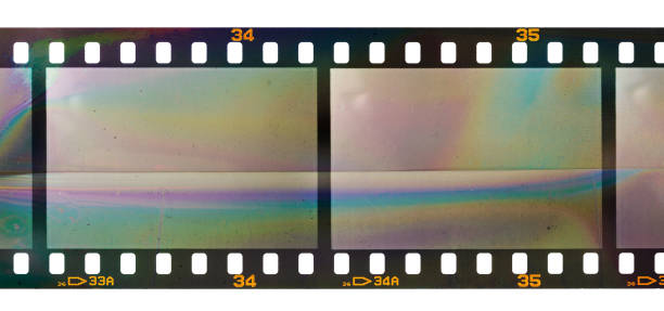 istock long 35mm film snip or strip with empty frames or cells on white background, just blend in your photos to make them look vintage. 1295066944
