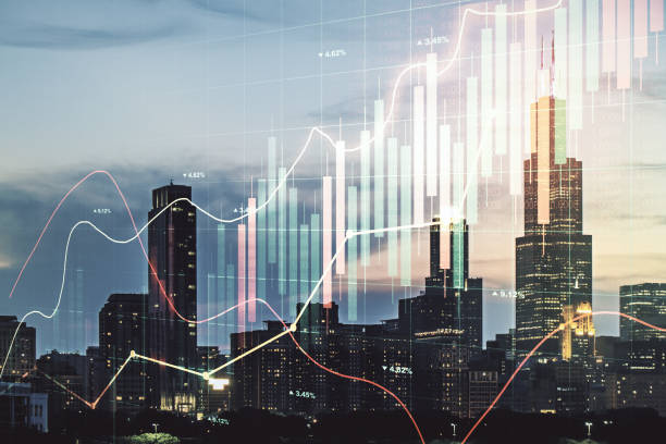 istock Multi exposure of virtual abstract financial graph interface on Chicago cityscape background, financial and trading concept 1295067883