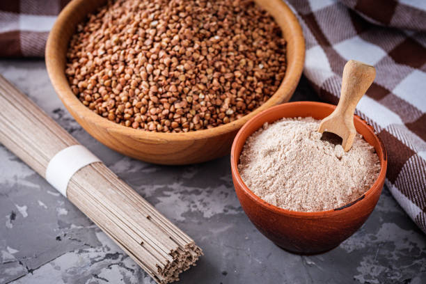 istock fresh natural buckwheat flour on a dark stone background culinary concept 1295073396