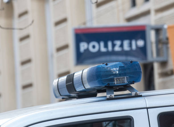 синий свет на крыше полицейской машины - ministry of the interior стоковые фото и изображения
