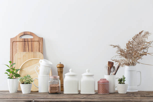 istock kitchen utensils on  wooden table in  white kitchen 1295074686
