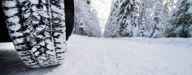 istock winter tyre with good profile on slippery road 1295078058