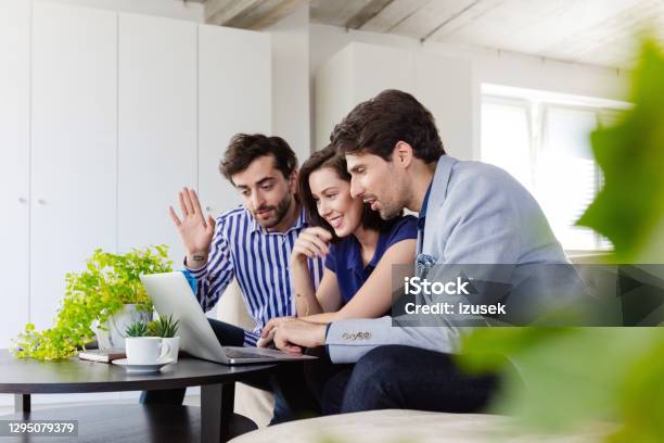Business Team During Video Call In A Green Office Stock Photo - Download Image Now - 30-39 Years, Adult, Adults Only