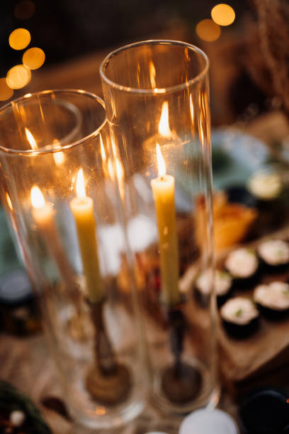 istock atmospheric candle decor with live fire on the banquet table 1295089424
