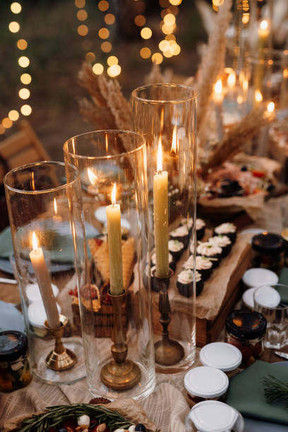 istock atmospheric candle decor with live fire on the banquet table 1295092894