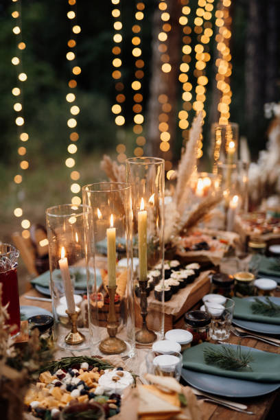 istock atmospheric candle decor with live fire on the banquet table 1295092987