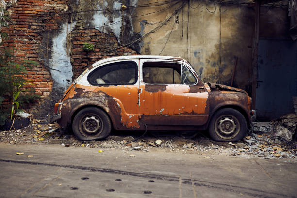 istock Old Abandoned vintage car wreck 1295093273
