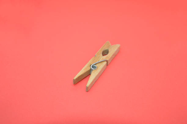 istock Clothespins to support the laundry while drying in the background 1295098871