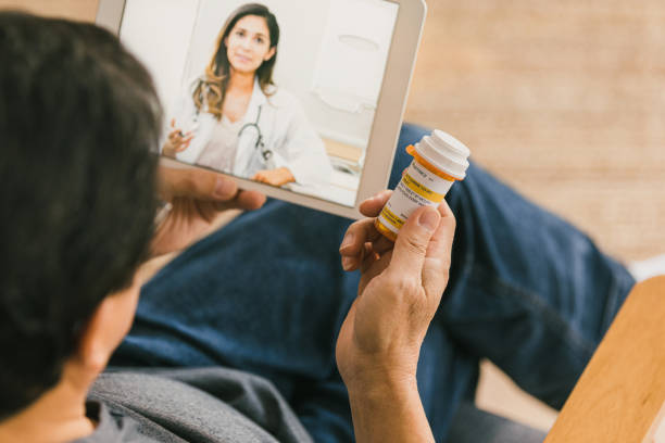 istock Senior man uses digital tablet for telemedicine appointment 1295099837
