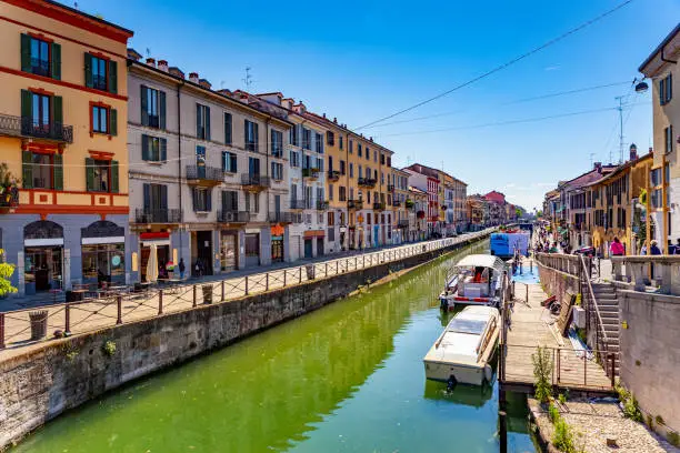 Photo of Naviglio Grande canal in Milan city, Italy, a popular tourist area
