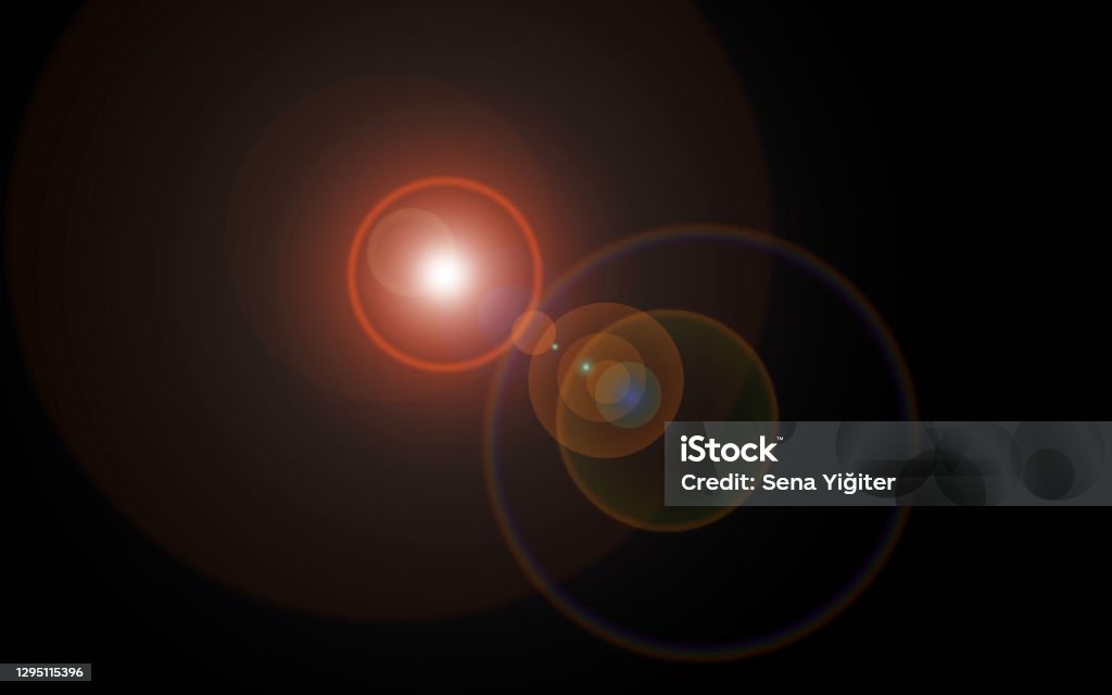 Lens flare looking like multi-colored cosmic spheres of light and reflected light in various sizes centered black background lens flare, light, black background, illustration, light leak Lens Flare Stock Photo