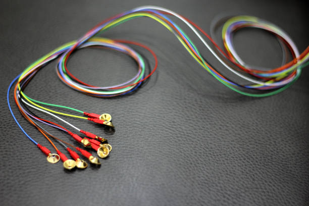 istock colored cables, clinical electrodes gold cup for electroencephalogram and medical electrodiagnosis 1295120528