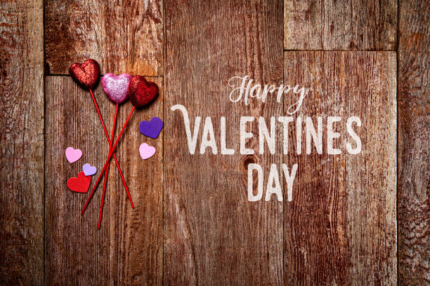 Valentines Day Gift and Decorations for a Party on Retro Wood Background