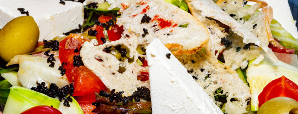 istock Salad with cheese, bread, ofochas and fruits 1295131847