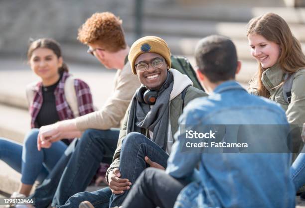 Hanging Out On Campus Stock Photo - Download Image Now - University Student, Student, Adolescence
