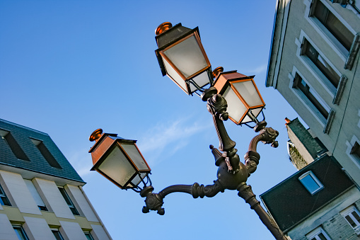 Paris, France - May 26th, 2019: Elegant antique street lamps.