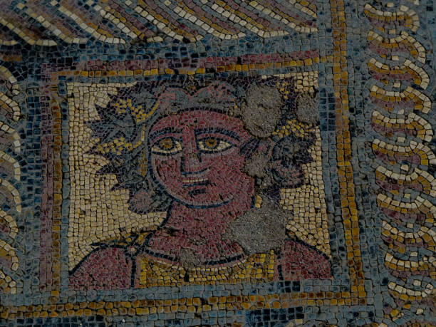 istock Roman mosaic floor. Man with laurel wreath. 1295141917