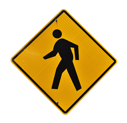 Pedestrian, old yellow road sign isolated on white background