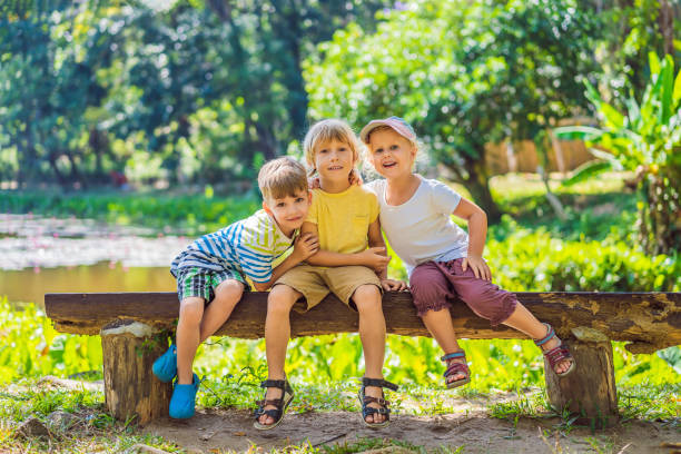 istock Children rest during a hike in the woods 1295146885