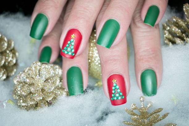 istock Christmas Themed Nail Art Design 1295146991