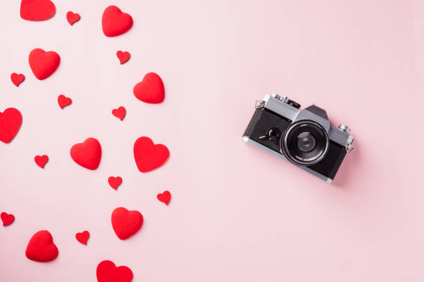 istock retro camera and red hearts composition greeting card 1295148906