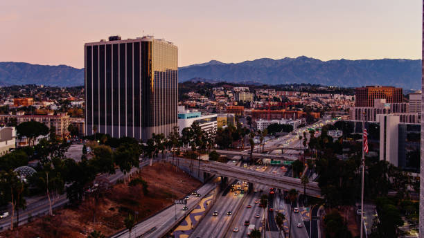 istock Los Angeles Freeway Before Sunrise - Aerial 1295173633