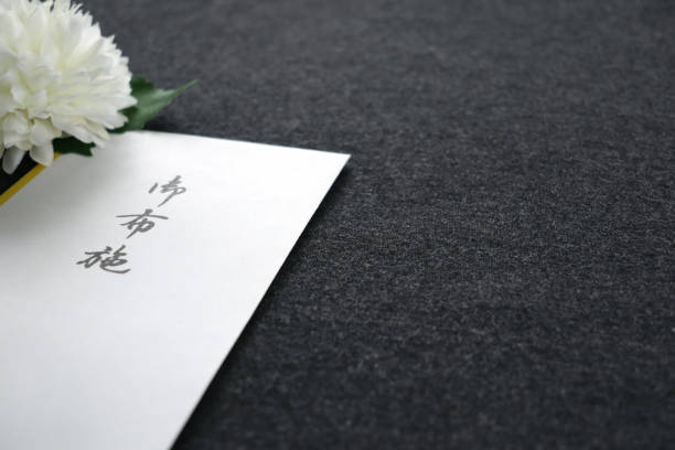 istock Envelopes for a reward to the monks. 1295179166