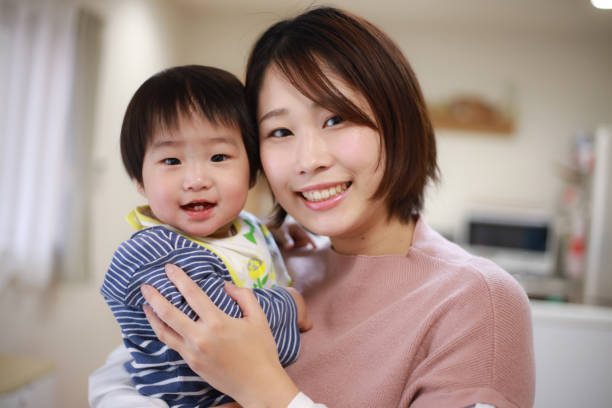 istock Smiley parent and child 1295184811