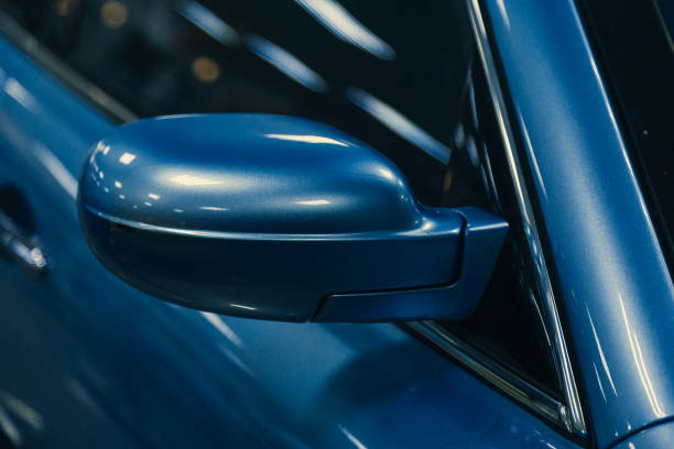 istock Side rear-view mirror on show car 1295208107