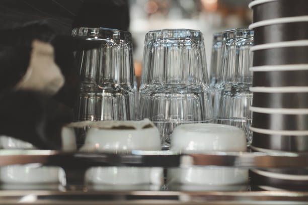 istock Selective focus of transparent glass coffee on coffee machine 1295208153