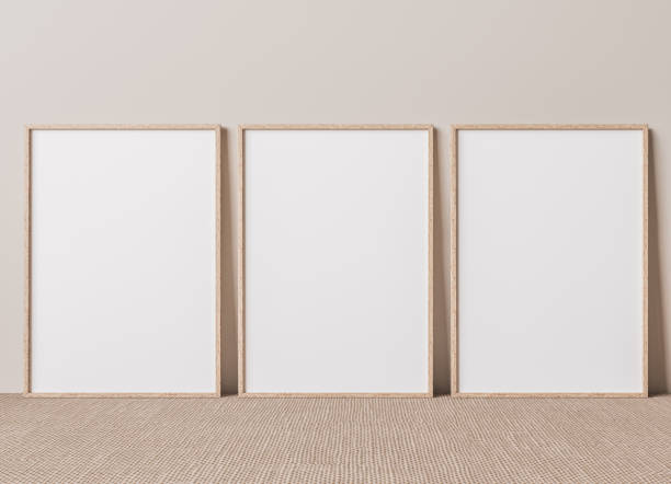 istock Blank vertical poster frame mock up standing on beige floor. 1295220294